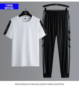 Detail of white men's sports t-shirt with black and grey striped shoulder patchwork