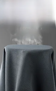 Detail showing high breathability and moisture-wicking texture of grey men's fabric