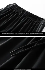 Detail of elastic ribbed waistband and black adjustable drawstring on sports shorts