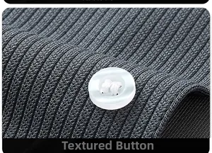 Macro shot of high-density grey knit fabric with a white textured four-hole button