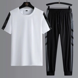 Men's white short sleeve sports set with quick-dry fabric and grey striped panels