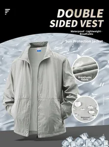Detail of grey quick-dry sun protection jacket with water-resistant and breathable fabric