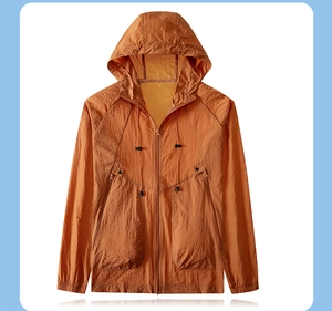Detail of caramel orange hooded sun protection jacket with adjustable zipper and high neck