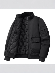 Black men's bomber jacket with quilted lining and utility pockets in a flat lay view