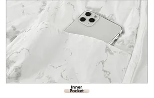 Détail de la poche intérieure avec smartphone et fermeture éclair blanche robuste