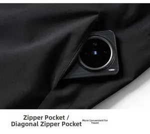 Close-up of waterproof outdoor jacket featuring a secure zipper pocket with a smartphone