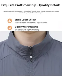 Close-up of grey sun protection jacket showing stand collar and high-quality zipper stitching