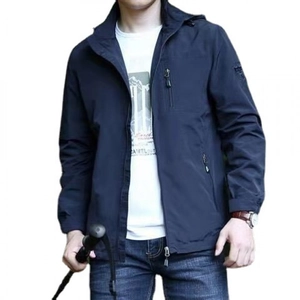 Men's navy hooded windbreaker jacket with multiple zip pockets and a minimalist outdoor style