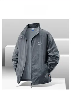 Detail of dark gray lightweight outdoor windbreaker with standing collar and zip closure