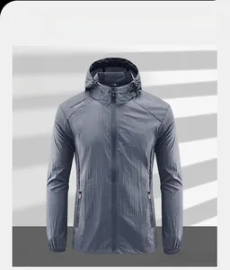 Detailed flat lay of dark gray hooded sun protection jacket with full zipper and thin fabric