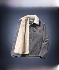 Flat lay of gray corduroy jacket showing soft white fleece lining and button pockets