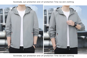 Détail de la veste de protection solaire grise pour homme avec capuche et tissu en soie glacée