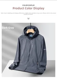 Detail of dark gray breathable sun protection jacket with hood and zip pockets