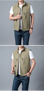 Detail shot of khaki outdoor fishing vest showing functional pockets and zipper design