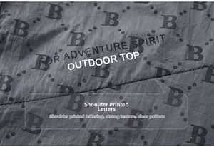 Macro detail of tear-resistant fabric featuring letter B print and adventure spirit logo
