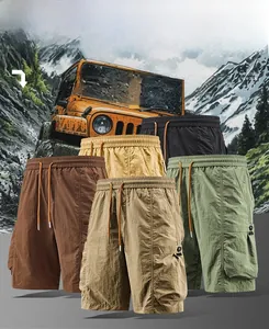 Detailed view showing five colors of men's loose cargo shorts with side utility pockets