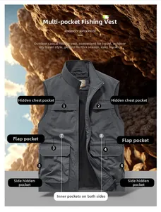 Detail of dark grey multi-pocket fishing vest showing waterproof windproof utility features