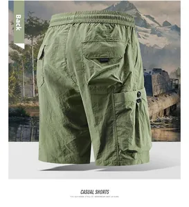 Rear view of army green cargo shorts featuring elastic waist and large back utility pockets