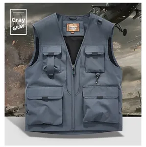 Detail view of grey tactical vest featuring utility flap pockets and breathable mesh lining