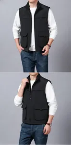 Close-up of black men's outdoor utility vest featuring multi-pocket design and zipper