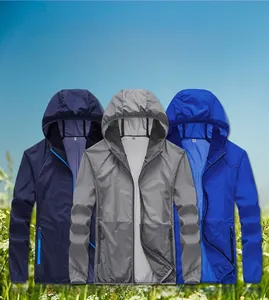 Close-up showing three colors of lightweight UV protection jackets on a grass background