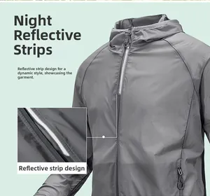 Detail of grey sun protection jacket showing high-visibility reflective zipper strip for safety