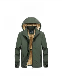Detail view of army green outdoor jacket featuring thick khaki fleece lining and windproof fabric