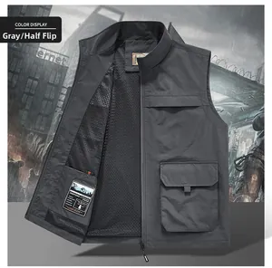 Detailed close-up of dark grey cargo vest featuring breathable mesh lining and utility pockets