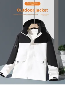 Detail of windproof adjustable hood and patchwork fabric on outdoor jacket
