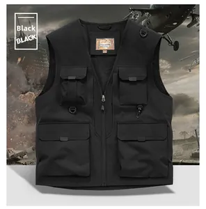 Detail of multi-pocket tactical outdoor vest featuring metal D-rings and mesh lining
