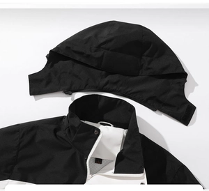 Detail of outdoor jacket with detachable hood, stand collar and breathable mesh lining