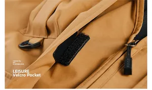 Detail of multi-pocket vest showing the velcro closure and high-quality utility fabric