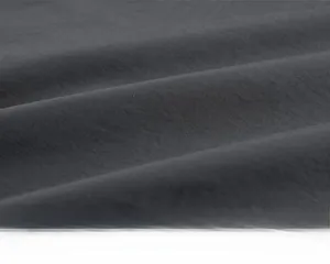 Detail of high-density breathable fabric texture for outdoor vest with wrinkle resistance