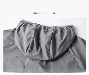 Detail view of the lightweight hooded sun protection jacket with elastic hood trim