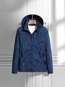 Waterproof windbreaker jacket in navy blue with palm leaf print and adjustable hood