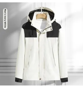 Détail de la veste outdoor imperméable pour hommes en blanc ivoire et noir contrasté