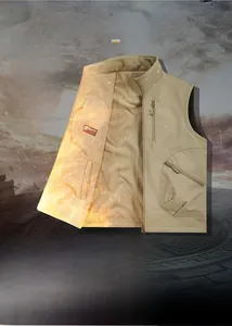 Detail of outdoor utility vest showing khaki fabric and warm fleece lining texture