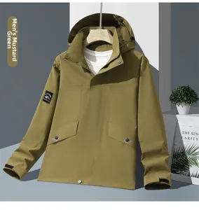 Detail view of mustard green outdoor waterproof jacket with adjustable drawstring hood and pockets