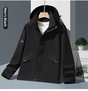 Detail of black waterproof outdoor jacket showing hooded collar and mountain logo