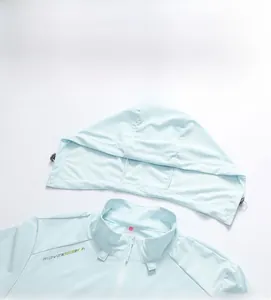 Detail of light blue UV protection jacket hood and zipper with MOVE SPORT logo