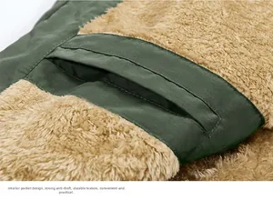 Detail of men's winter coat featuring a secure inner pocket with camel fleece lining