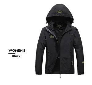 Detail of black women's outdoor jacket showing windproof fabric and yellow mountain logo