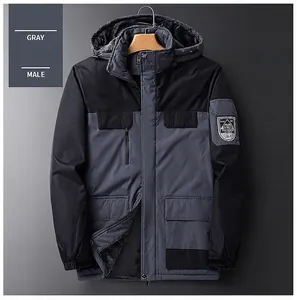 Detail of men's outdoor jacket showing warm black fleece lining and gray windproof fabric