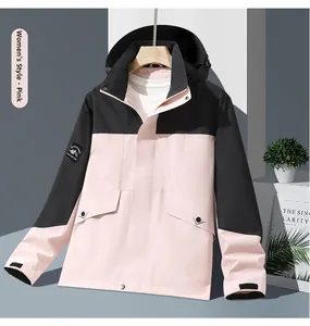 Detail of women's outdoor windbreaker in pink and black with adjustable velcro cuffs