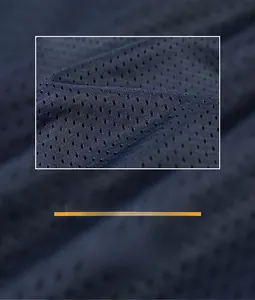 Close-up of breathable navy blue mesh lining fabric for men's outdoor windbreaker jacket