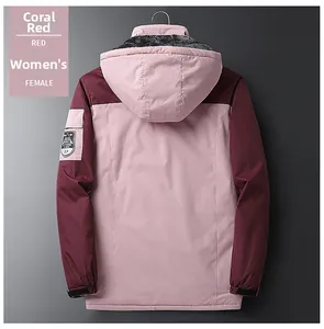Back view of women's coral red hooded outdoor jacket with warm fleece lining