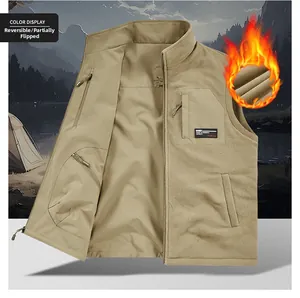 Close-up of khaki reversible outdoor tactical fleece vest with multiple zip pockets