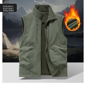 Detail of army green outdoor utility vest with fleece lining and multi-zipper pockets