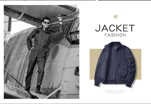 Detail showing tactical sleeve pocket and flap pockets on navy windproof jacket