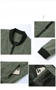 Detail view of military green bomber jacket featuring ribbed collar and metal zipper texture